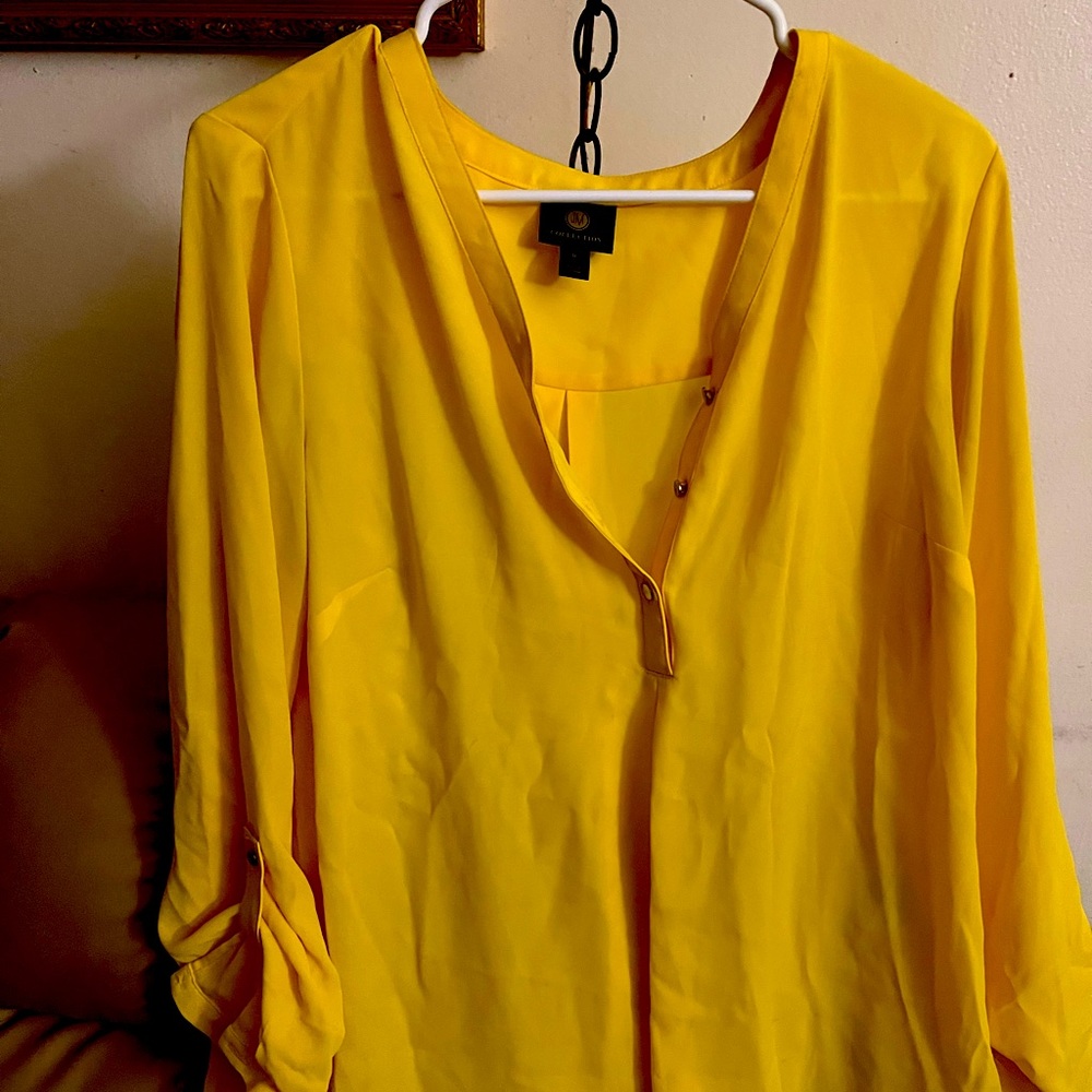 Yellow satiny dressy stylish long sleeve shirt. Brand new. Medium women’s